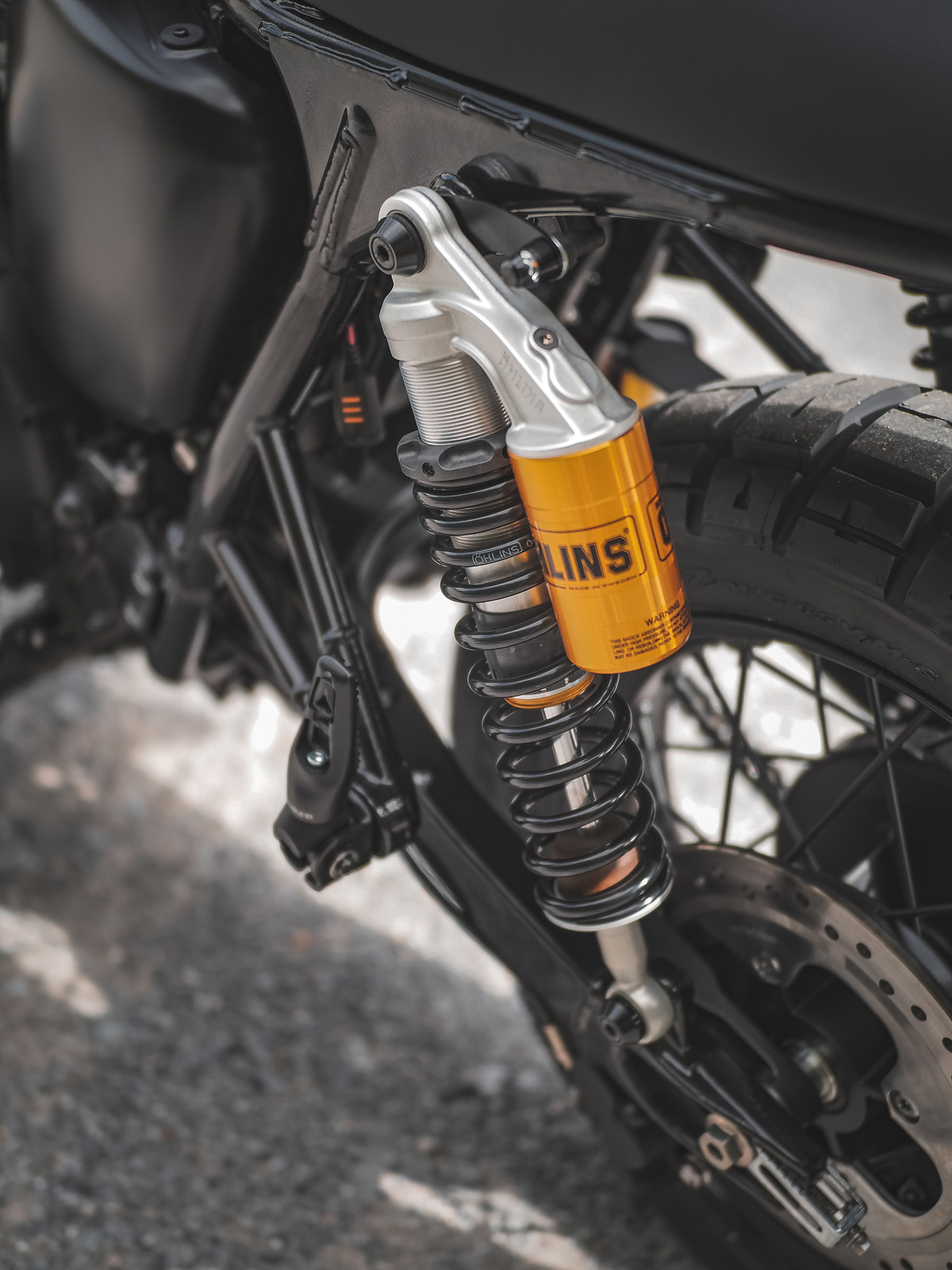 Öhlins shock absorber with compensating tank